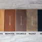 Leather Color Swatches. From left to right, Mesquite, Redwood, Cocobolo, Walnut, and Ebony.